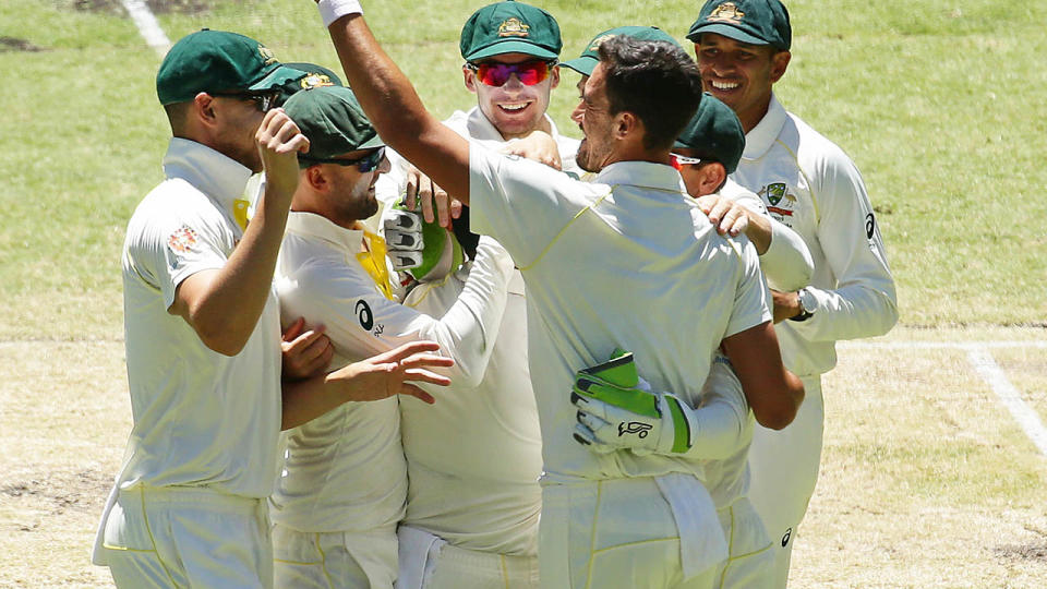 The Aussies celebrate. (Photo by Will Russell – CA/Cricket Australia/Getty Images)