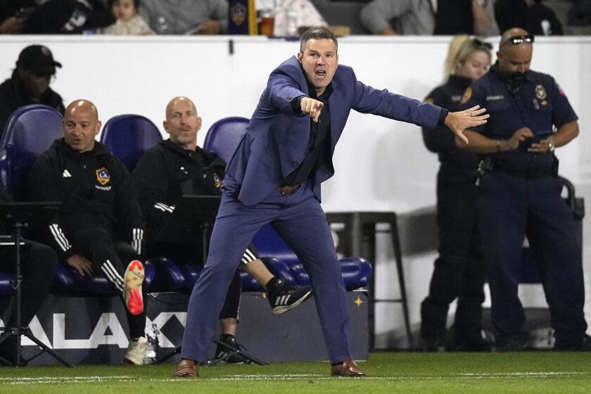 LA Galaxy head coach Greg Vanney gestures to his team during the second half of a Major League Soccer match against the Houston Dynamo Saturday, May 25, 2024, in Carson, Calif. (AP Photo/Mark J. Terrill)