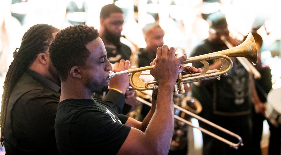 The Avant Garde band leads a second line procession during the Juneteenth Celebration held at the Montgomery Museum of Fine Arts in Montgomery, Ala., on Saturday June 19, 2021. 