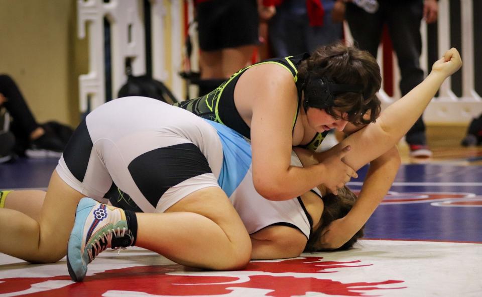 Ventura's Sabrina Scott has control of Buena's Amilia Slocum during the Channel League wrestling championships on Saturday at San Marcos High. Scott won the 192-pound title.