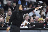 South Carolina head coach Dawn Staley communicates with players during the second half of an NCAA college basketball game against Mississippi, Thursday, Jan. 27, 2022, in Columbia, S.C. (AP Photo/Sean Rayford)