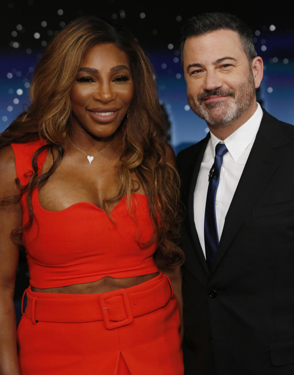 serena williams in a red outfit and jimmy kimmel in a black suit