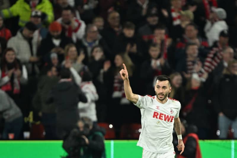 Cologne's Sargis Adamyan celebrates scoring his side's first goal during the German Bundesliga soccer match between 1. FC Cologne and RB Leipzig at RheinEnergieStadion. Federico Gambarini/dpa