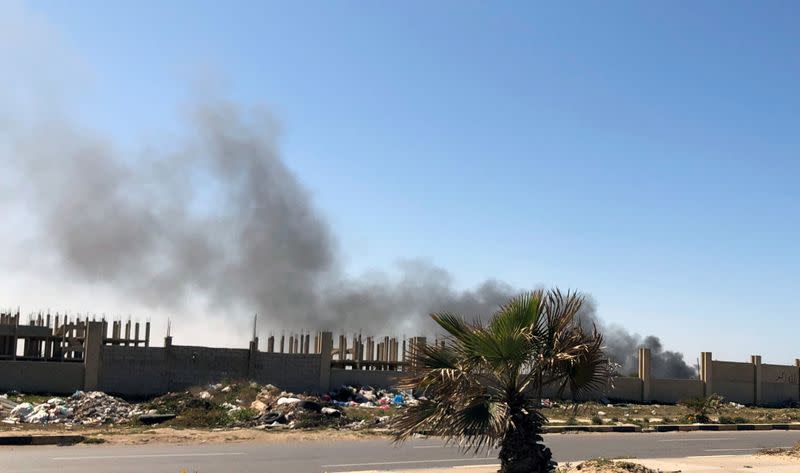 Smoke rises from Mitiga Airport after being attacked in Tripoli