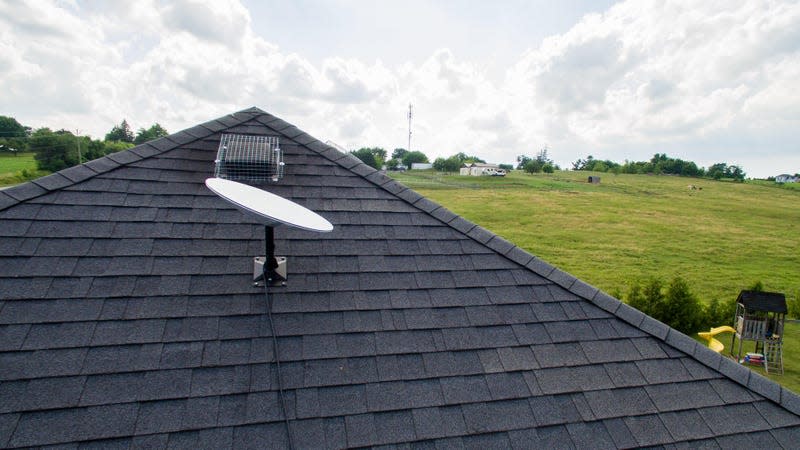 A Starlink dish connected to a home in rural Canada.