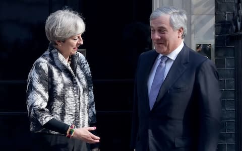 Prime Minister Theresa May greets the President of the European Parliament Antonio Tajani in April - Credit: Gareth Fuller/PA 