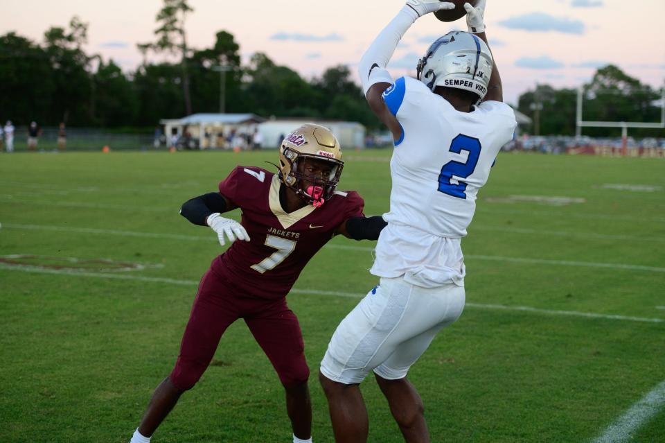 Bartram Trail receiver Elo Modozie (2) catches a pass in the corner of the end zone against St. Augustine in 2021.