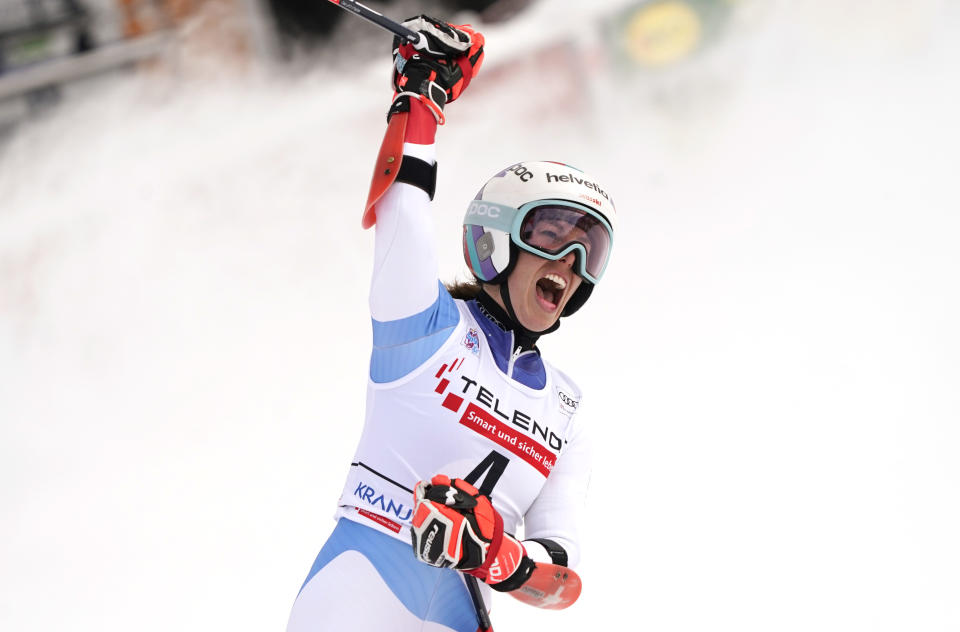 Switzerland's Michelle Gisin reacts after completing an alpine ski, women's World Cup giant slalom, in Kranjska Gora, Slovenia, Sunday, Jan. 17, 2021. (AP Photo/Giovanni Auletta)