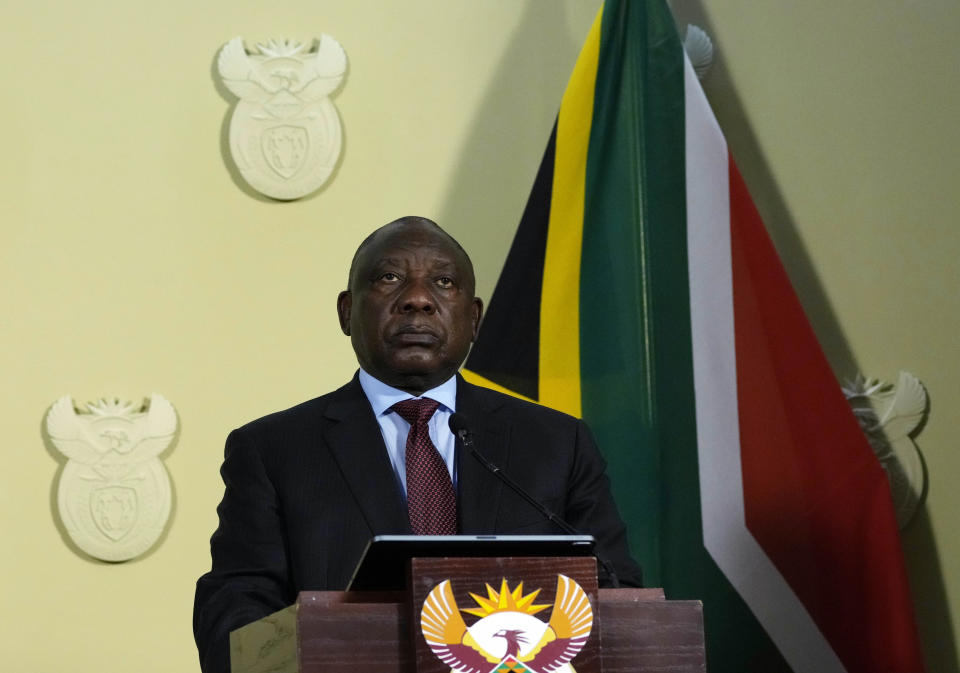 South Africa's President Cyril Ramaphosa looks on during the final report of a judicial investigation into corruption by Chief Justice Raymond Zondo at Union Building in Pretoria, South Africa, Wednesday, June 22, 2022. The probe has laid bare the rampant corruption in government and state-owned companies during former President Jacob Zuma’s tenure from 2009 to 2018. (AP Photo/Themba Hadebe)