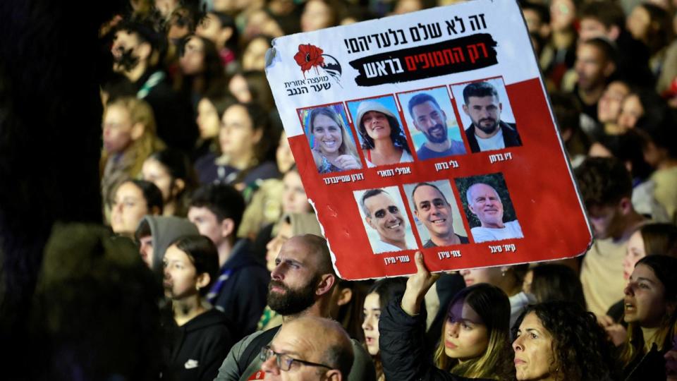 PHOTO: Israeli youth, led by Israeli Scouts from Kibbutz Kfar Aza, rally for the release of hostages being held in Gaza that were kidnapped during the deadly October 7 attack by Palestinian Islamist group Hamas, in Jerusalem, Dec. 28, 2023.  (Ammar Awad/Reuters)