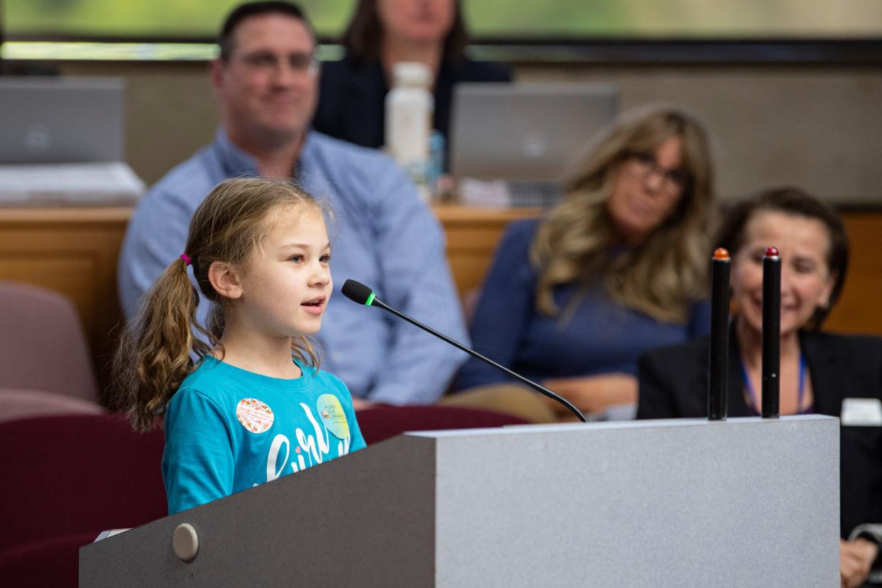 Zoey Harper, a resident of Ward 7, speaks against library budget cuts Wednesday night in the Council Chambers at the Salem Civic Center.