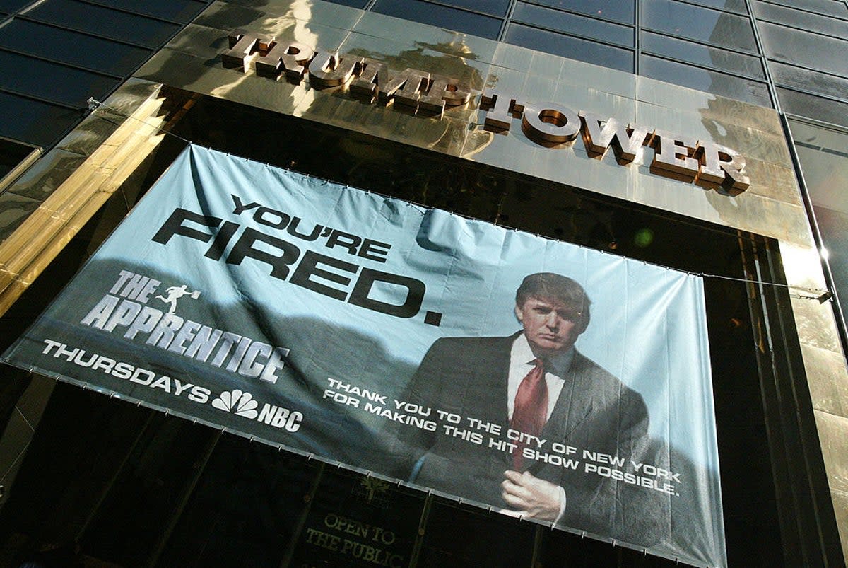 A promotional banner for The Apprentice adorns Trump Tower (Getty)