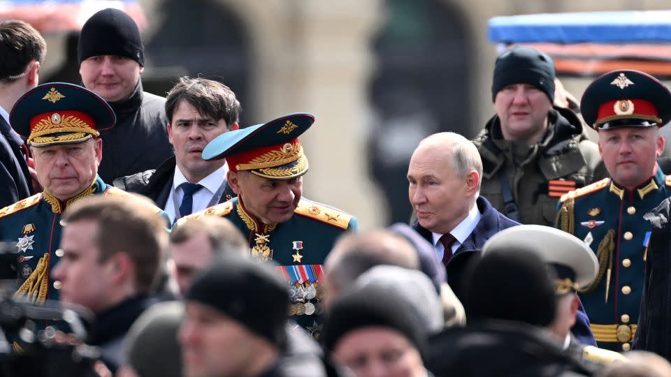 Russia's President Vladimir Putin, center-right, with Sergei Shoigu, at Red Square for the Victory Day military parade in central Moscow on May 9, 2024. - Natalia Kolesnikova/AFP/Getty Images