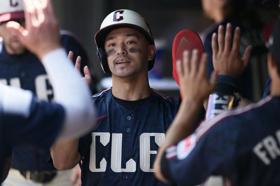 Guardians' Steven Kwan celebrates after scoring against the Kansas City Royals on June 6 in Cleveland.