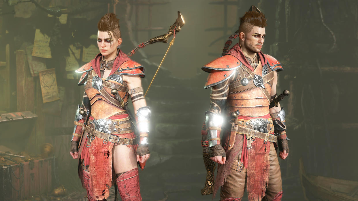  Two Diablo 4 rogues in red armor standing next to each other. 