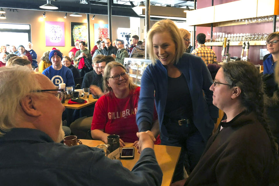 Sen. Kirsten Gillibrand, D-N.Y. greets patrons at Stomping Grounds Cafe in Ames, Iowa, on Saturday, Jan. 19, 2019. Gillibrand continued her first trip to the leadoff caucus state since announcing the formation of an exploratory committee to seek the 2020 Democratic presidential nomination.(AP Photo/Juana Summers)