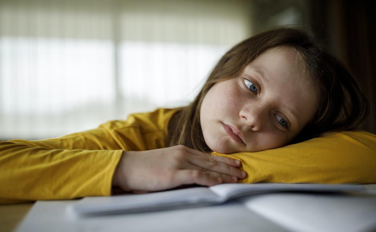 <span class="caption">On average, two students in every U.S. classroom have ADHD.</span> <span class="attribution"><a class="link " href="https://www.gettyimages.com/detail/photo/bored-young-school-girl-studying-at-home-royalty-free-image/1291247838?adppopup=true" rel="nofollow noopener" target="_blank" data-ylk="slk:damircudic/E+ via Getty Images;elm:context_link;itc:0;sec:content-canvas"> damircudic/E+ via Getty Images</a></span>