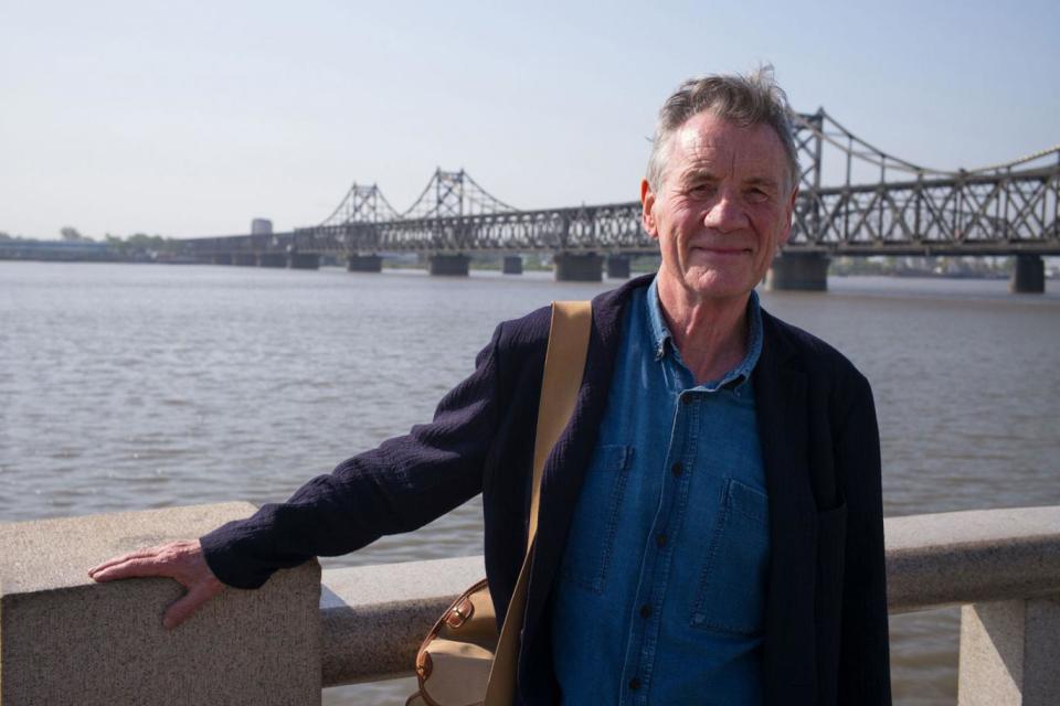 Pictured: Michael Palin standing near Sino-Korean Friendship bridge that seperates North Korea and South Korea (Channel 5)