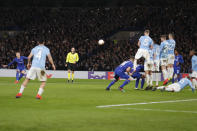 Chelseas' Ross Barkley, left, scores his side's second goal with a free kick during the round of 32, second leg, Europa League soccer match between Chelsea and Malmo FF at Stamford Bridge stadium in London, Thursday Feb. 21, 2019. (AP Photo/Frank Augstein)