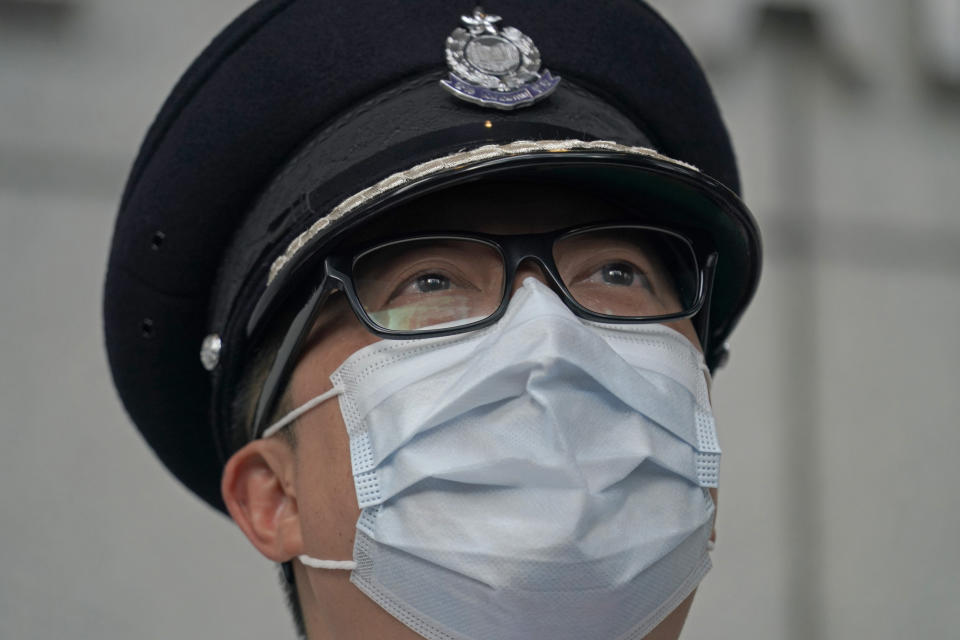 Chris Tang, commissioner of the Hong Kong Police Force, speaks during a press conference in Hong Kong, Wednesday, May 12, 2021. A top Hong Kong national security officer was reportedly caught up in a raid on an unlicensed massage business, and will face a police force investigation into the alleged misconduct. Hong Kong’s Director of National Security Frederic Choi has since been put on leave after the incident, according to Tang. (AP Photo/Kin Cheung)