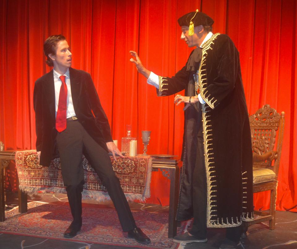 John Hanright, left, as Jonathan Harker and Bragan Thomas as vampire Dracula in the premiere of Thomas' adaptation of "Dracula" at Chatham Drama Guild.