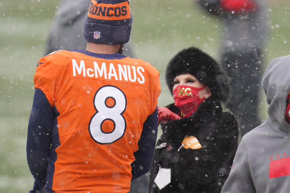 FILE - Norma Hunt, of the Kansas City Chiefs, talks with Denver Broncos kicker Brandon McManus (8) before an NFL football game Sunday, Oct. 25, 2020, in Denver. In a statement released by the Chiefs, Sunday, June 4, 2023, Hunt, the second wife of the late Kansas City Chiefs founder Lamar Hunt and the only woman to attend every Super Bowl, has died. She was 85. (AP Photo/David Zalubowski, File)