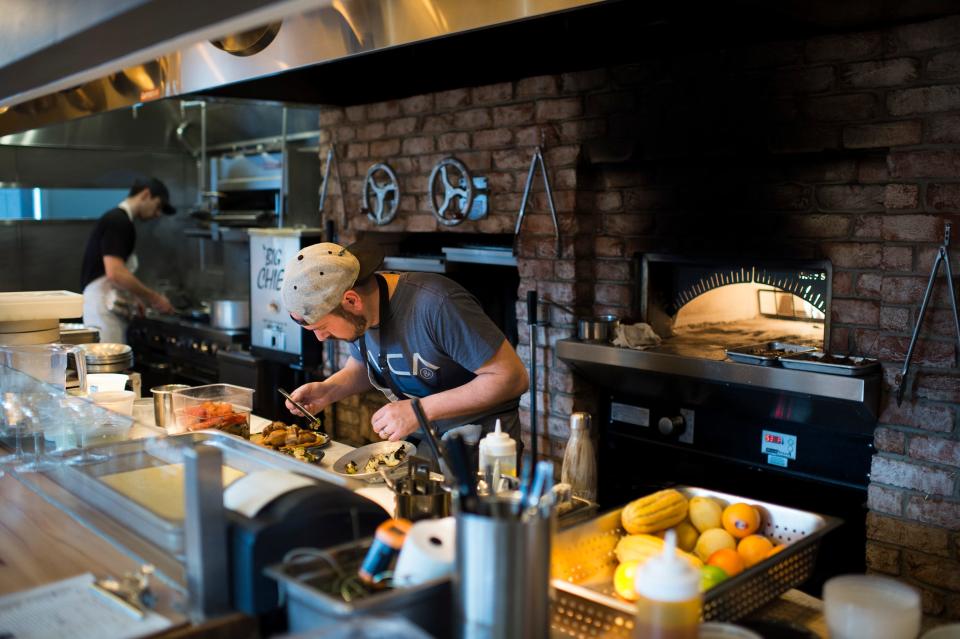 Chef and owner Dominic Piperno works on a dish inside Hearthside in Collingswood, N.J.