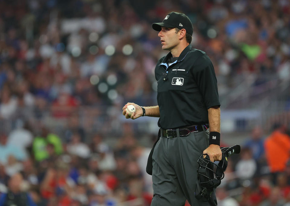 ATLANTA, GEORGIA - JULY 18:  Homeplate umpire Pat Hoberg #31 pauses the game in the sixth inning between the Atlanta Braves and the Arizona Diamondbacks at Truist Park on July 18, 2023 in Atlanta, Georgia. (Photo by Kevin C. Cox/Getty Images)