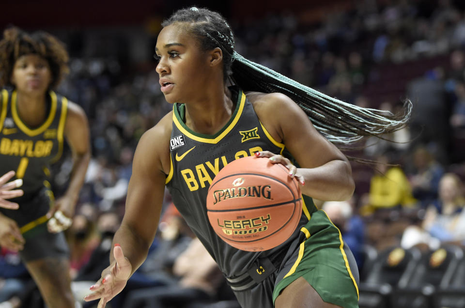 Baylor's Jordan Lewis handles the ball against Michigan during the Basketball Hall of Fame Women's Showcase at Mohegan Sun Arena in Uncasville, Connecticut, on Dec. 19, 2021. (Photo by G Fiume/Getty Images)