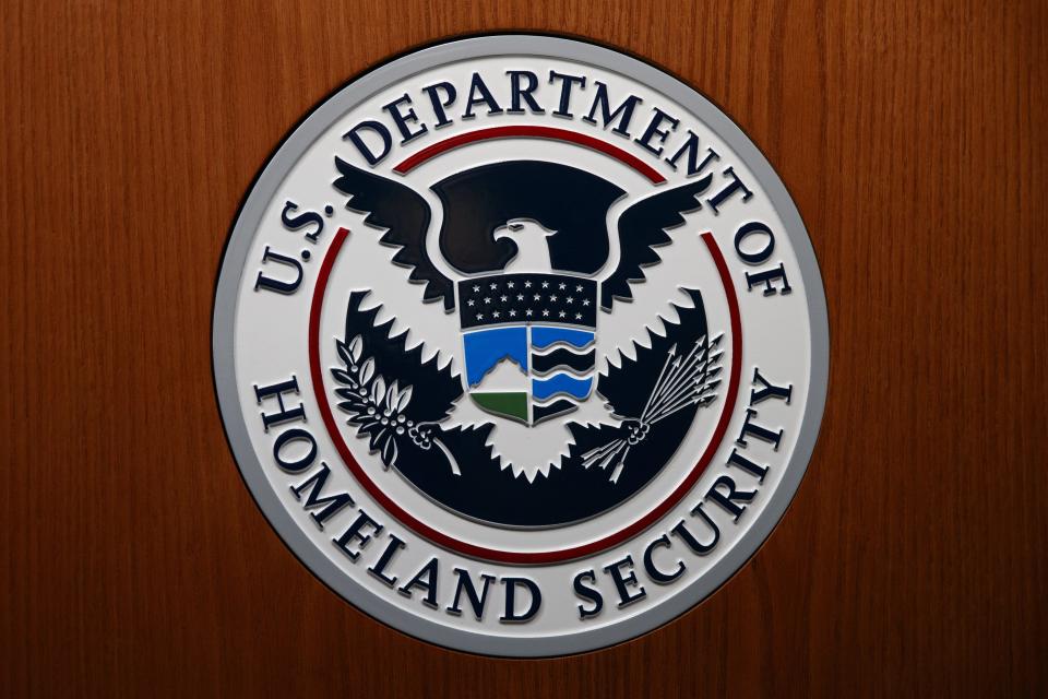 The Department of Homeland Security (DHS) seal is seen during a 2018 news conference in Washington.