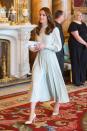 <p>The Duchess wore <a href="https://www.townandcountrymag.com/style/fashion-trends/a26630013/kate-middleton-blue-dress-princes-charles-investiture-anniversary/" rel="nofollow noopener" target="_blank" data-ylk="slk:a pale blue dress;elm:context_link;itc:0;sec:content-canvas" class="link ">a pale blue dress</a> with nude heels and a small clutch to a celebration at Buckingham Palace in honor of the <a href="https://www.townandcountrymag.com/society/tradition/a26576659/prince-charles-prince-wales-investiture-1969-true-story/" rel="nofollow noopener" target="_blank" data-ylk="slk:50th anniversary of Prince Charles's investiture;elm:context_link;itc:0;sec:content-canvas" class="link ">50th anniversary of Prince Charles's investiture</a> as the Prince of Wales.</p>