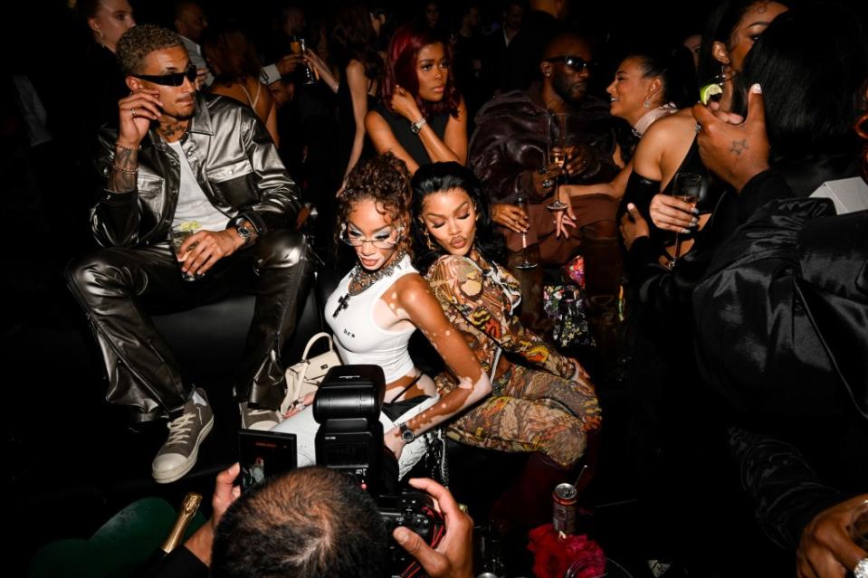 Winnie Harlow and Teyana Taylor posed back-to-back while kicking it at the Casa Cipriani shindig. WWD via Getty Images