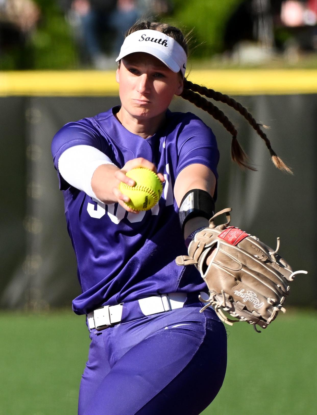 Bloomington South’s Kinsey Clopton pitches during the softball game against Bloomington North at South on Wednesday, April 24, 2024.