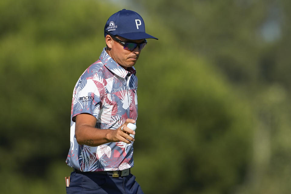 Rickie Fowler waves after his putt on the 12th hole during the second round of the U.S. Open golf tournament at Los Angeles Country Club on Friday, June 16, 2023, in Los Angeles. (AP Photo/Matt York)