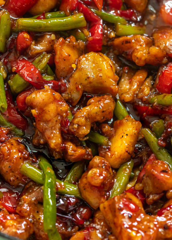 <p>Whisk it Real Gud</p><p>This Thai chicken green bean stir fry is absolutely mouth-watering. It's beyond delicious. Juicy pieces of crispy chicken and green beans are covered in a sweet chili sauce.</p><p><strong>Get the recipe: <a href="https://whiskitrealgud.com/thai-chicken-stir-fry-with-green-beans/" rel="nofollow noopener" target="_blank" data-ylk="slk:Thai Chicken and Green Bean Stir Fry;elm:context_link;itc:0;sec:content-canvas" class="link ">Thai Chicken and Green Bean Stir Fry</a></strong></p>