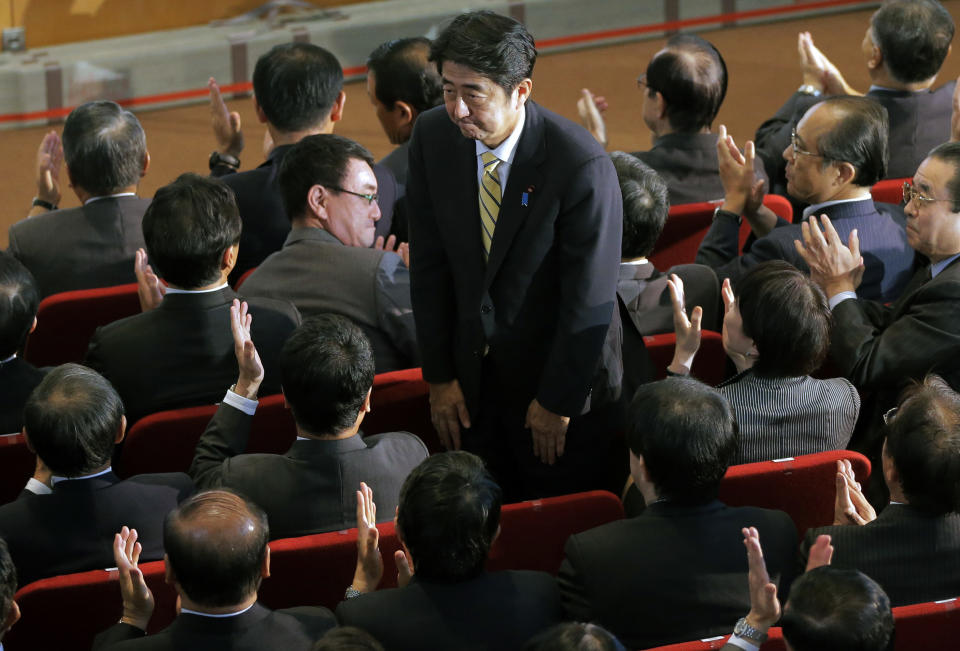 Former Prime Minister Shinzo Abe bows after winning the party leader election of Japan's main opposition Liberal Democratic Party in Tokyo, Wednesday, Sept. 26, 2012. Abe, who was prime minister for a year before abruptly resigning in 2007 with an intestinal ailment, would most likely get another shot at leading Japan if polls prove correct and the LDP wins the most seats in the next election.(AP Photo/Itsuo Inouye)