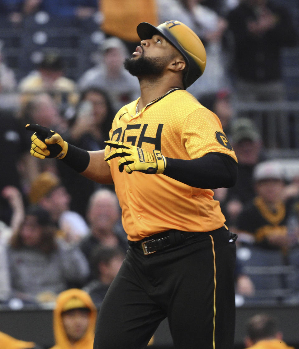 Pittsburgh Pirates' Carlos Santana looks up as he crosses the plate on a solo home run against the San Diego Padres during the third inning of a baseball game Tuesday, June 27, 2023, in Pittsburgh. (AP Photo/Justin Berl)