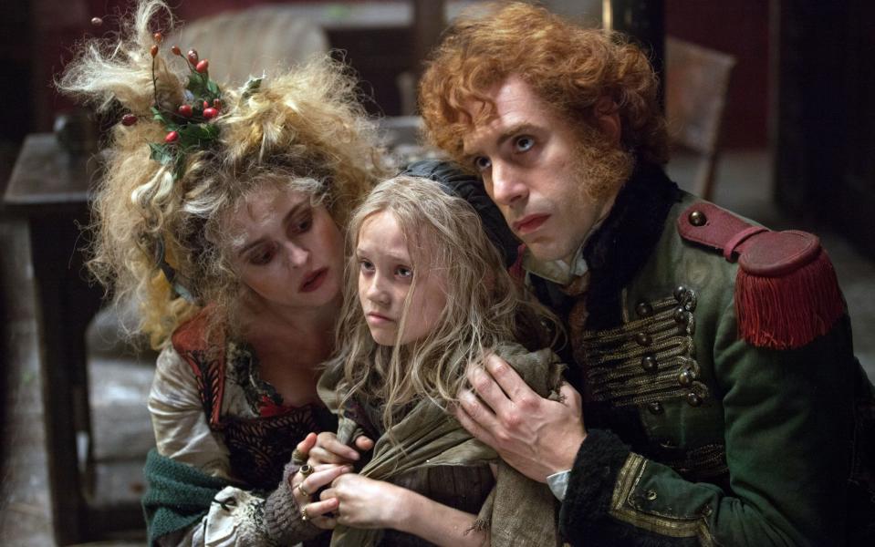 From left: Helena Bonham Carter, Isabelle Allen and Sacha Baron Cohen in the 2012 film - Rex