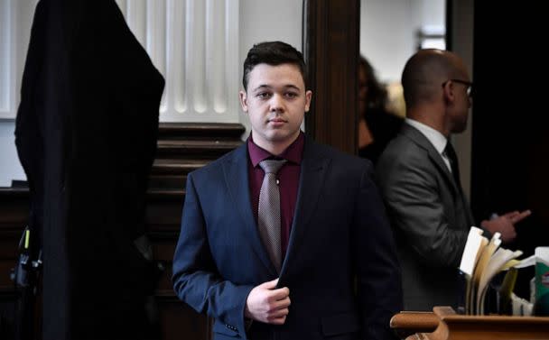 PHOTO: Kyle Rittenhouse enters the courtroom to hear the verdicts in his trial prior to being found not guilty on all counts at the Kenosha County Courthouse, Nov. 19, 2021, in Kenosha, Wis. (Pool via Getty Images)