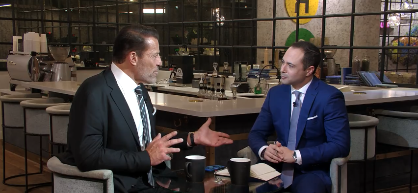 Life and business strategist Tony Robbins (left) reminds investors that diversification is important in an interview with Yahoo Finance Executive Editor Brian Sozzi (right)