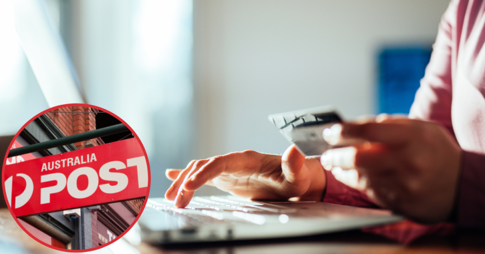 Australia Post sign. Woman using her laptop and holding a credit card.