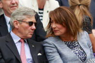 <p>The Duchess of Cambridge’s parents, Michael and Carole Middleton, donned their finest attire for their centre court moment. <i>[Photo: Getty]</i></p>