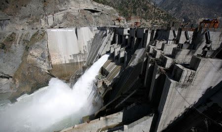 A general view of a newly inaugurated 450-megawatt hydropower project located at Baglihar Dam on the Chenab river which flows from Indian Kashmir into Pakistan, is seen at Chanderkote, about 145 km (90 miles) north of Jammu, October 10, 2008. REUTERS/Amit Gupta/File Photo