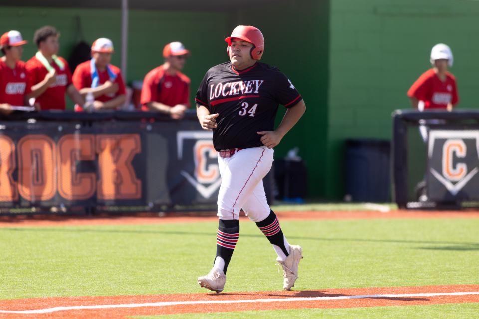 Lockney’s Josh Jimenez (34) heads to home plate during the second game of a Class 2A playoff series, Friday, May 13, 2022, against Gruver at Caprock High School in Amarillo.