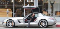 12. Gullwing doors<br><br> Like suicide doors, gullwings often show up on concept vehicles, then magically transform into conventional doors once lawyers and accountants start attending design meetings. That's too bad, because few things are as impressive as opening a gullwing door, except opening both at the same time.