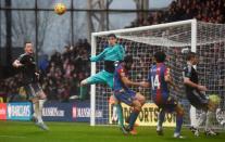 Football Soccer - Crystal Palace v Chelsea - Barclays Premier League - Selhurst Park - 3/1/16 Crystal Palace's Mile Jedinak in action with Chelsea's Thibaut Courtois Reuters / Dylan Martinez Livepic