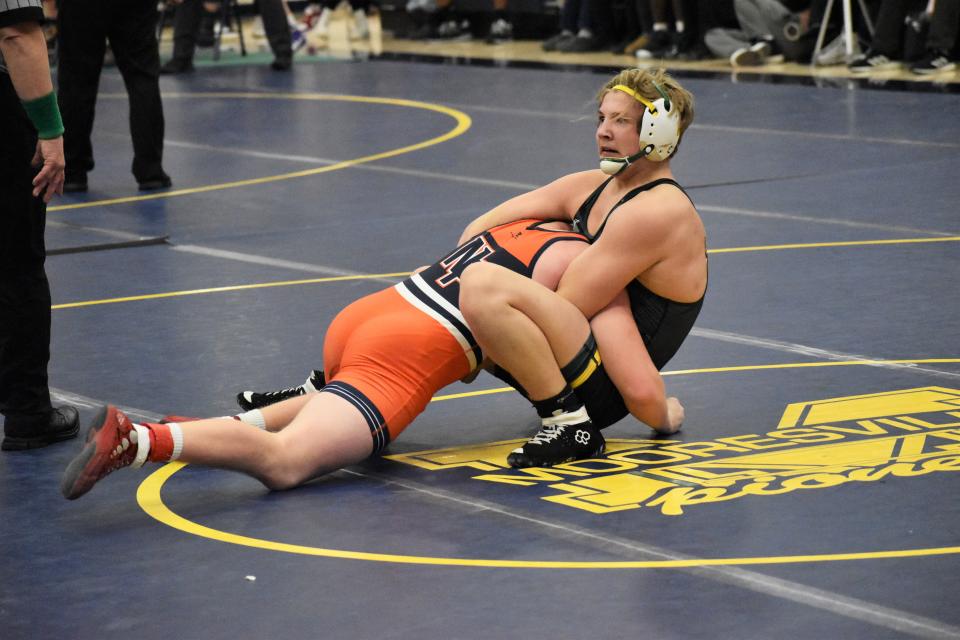 Monrovia's Drew Elmore puts North Putnam's Lucas Murphy in a headlock during regionals at Mooresville on Feb. 4, 2023.