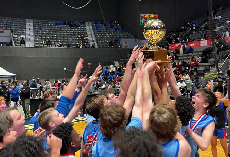 Ingomar celebrates its MHSAA Class 2A boys basketball state title win over Bogue Chitto at the Mississippi Colisuem on Friday March 1, 2024.