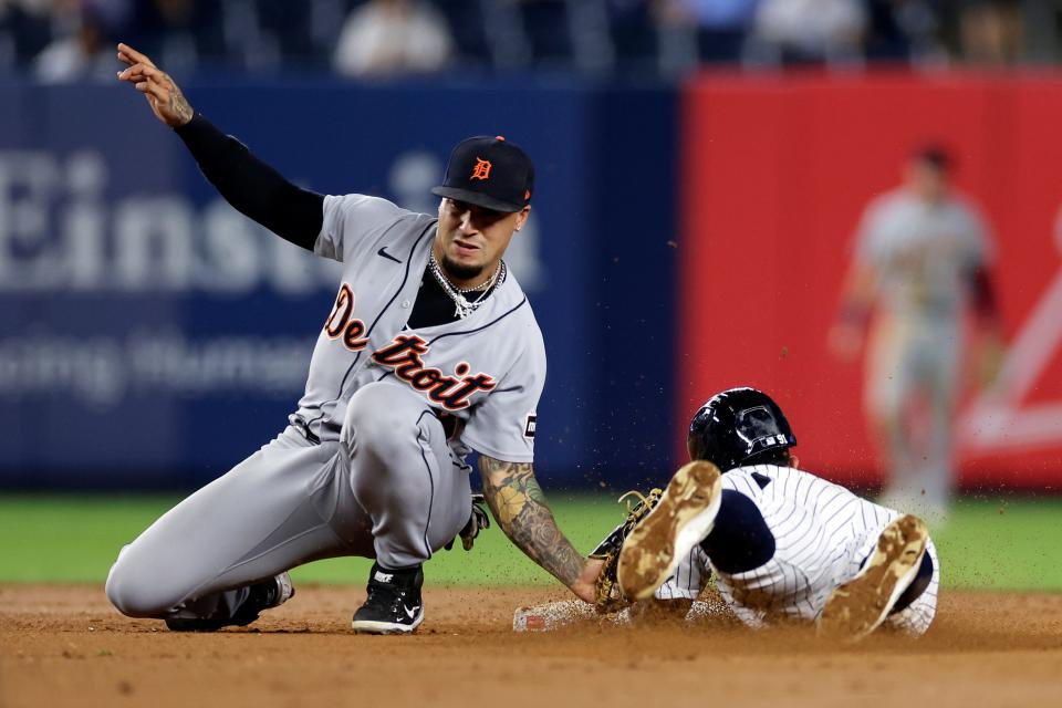 Detroit Tigers shortstop Javier Baez, left, tags out New York Yankees' Oswald Peraza attempting to steal second base during the eighth inning at Yankee Stadium in New York on Wednesday, Sept. 6, 2023.