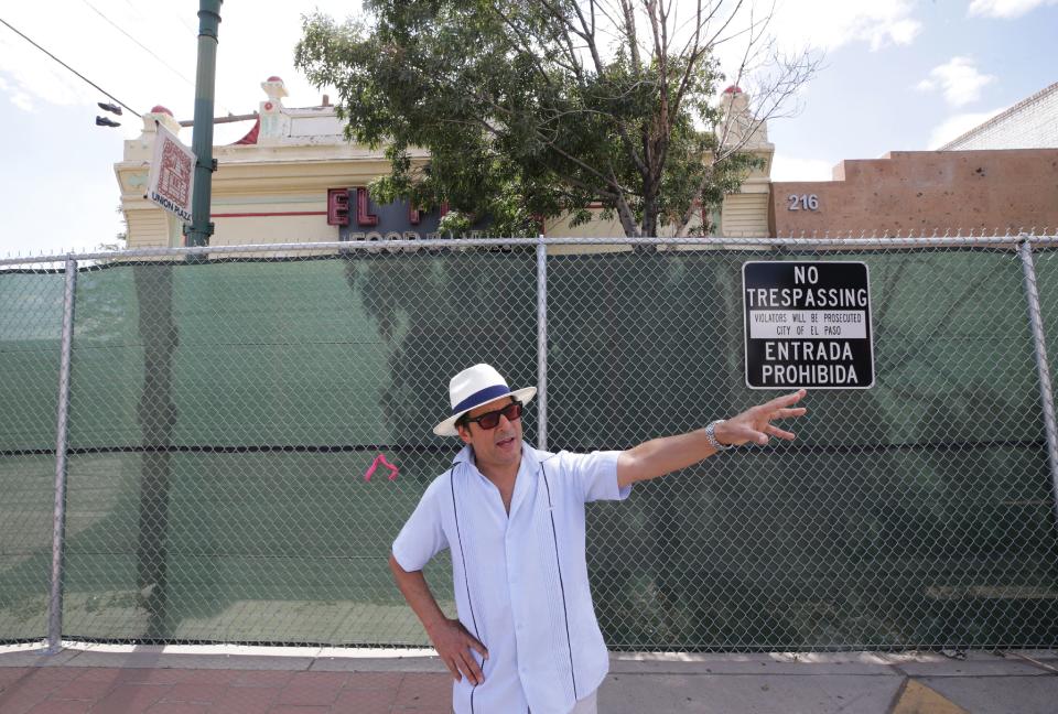Max Grossman, UTEP professor and board member of the Trost Society, points out historic buildings within the Union Plaza neighborhood that are slated for demolition to make way for a sports arena. The building behind Grossman was a Chinese laundry building, he says its the last known building built by El Paso’s Chinese community.
